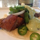 Almost Ninfa's green sauce with Crispy pork carnitas.